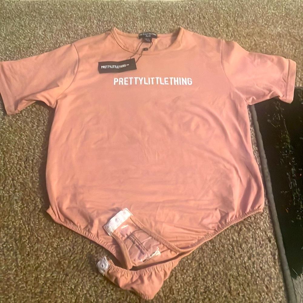 BRAND NEW light pink pretty little thing bodysuit size 14 never been worn